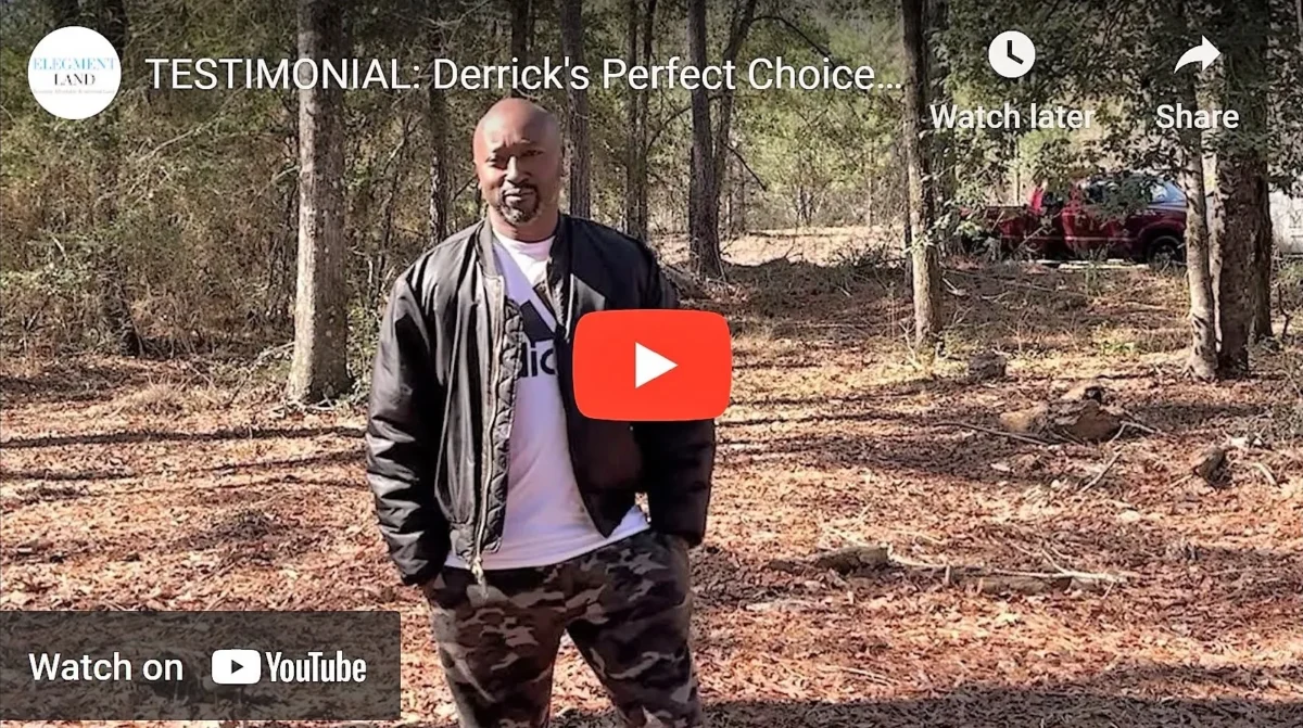 Man standing on a wooded lot in a video thumbnail