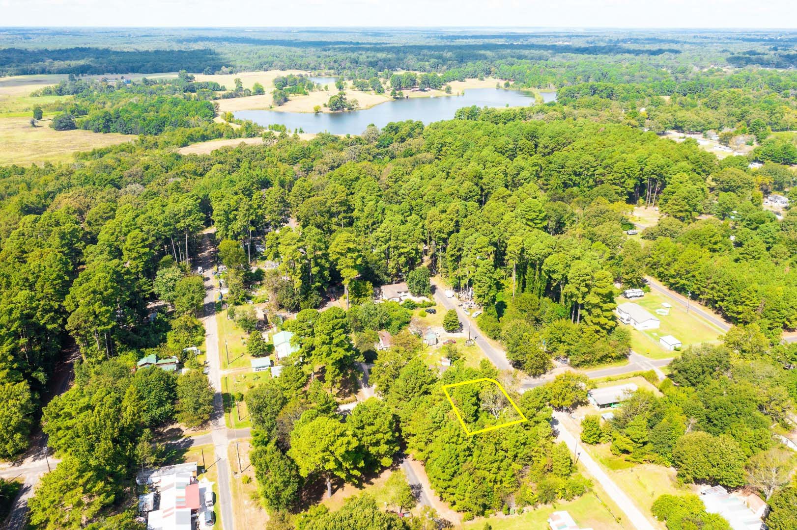Land for Sale in Texas 0.11 Acre Wooded Corner Lot with Electric, Water in Quitman TX