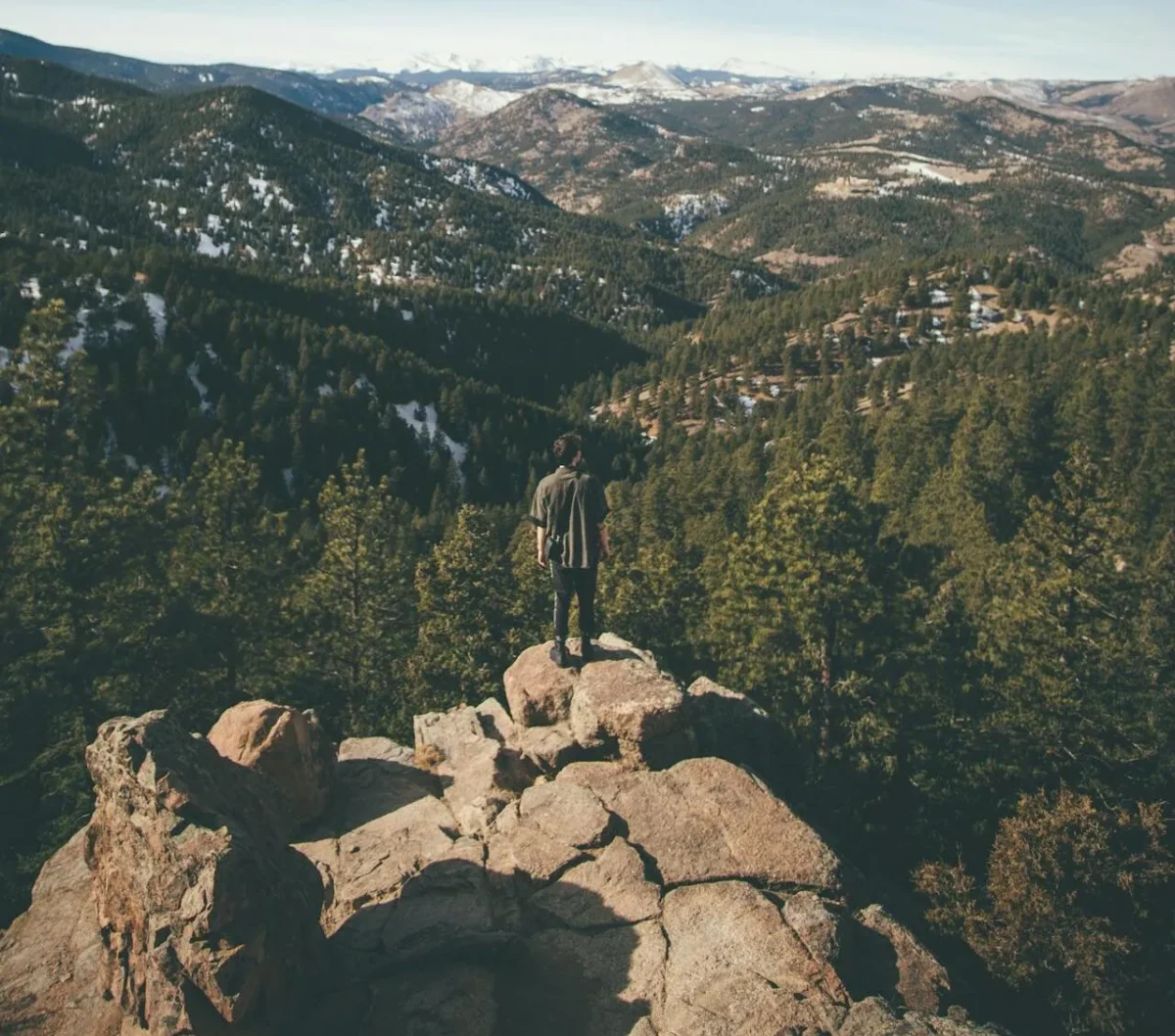 Hikers overlooking a rocky mountain valley